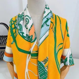 Detail of 130cm bright yellow royal horse carriage shawl with green floral silk texture