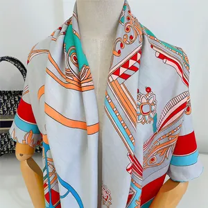 Detail of European carriage pattern shawl on mannequin with silk texture and drape