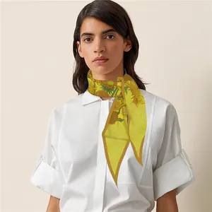 Artistic silk scarf with Van Gogh sunflower print worn elegantly on a white shirt