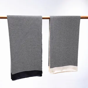 Classic houndstooth winter shawl for women in silk-feel fabric with wide black and white borders