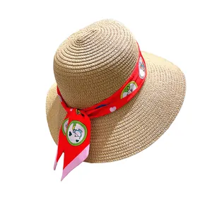 Chapeau de soleil en paille pour femme avec ruban décoratif rouge et motifs d'éléphants