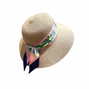 Strohoed voor dames met kleurrijk bloemenlint en France Paris strik detail op de zijkant