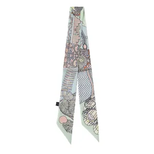 Elegant mint green Twilly scarf with abstract geometric print and floral details