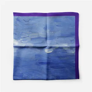 Detailed flat lay of a square silk scarf with blue oil painting print and purple borders