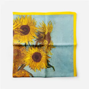 Detailed flat lay of Van Gogh Sunflower silk square scarf with vibrant yellow stitching