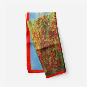 Detailed close-up of a 53cm silk scarf featuring oil painting flowers and red borders