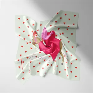 Artistic silk square scarf detail showing red hearts and brown horse illustration