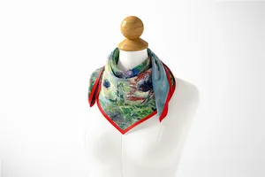 Detail of Monet style silk scarf on mannequin highlighting impressionist floral patterns