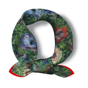 Detail of Monet style silk scarf featuring red hand-rolled edges and oil painting floral print