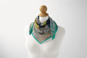 Detail of silk scarf with Monet Impressionist oil painting pattern on a mannequin