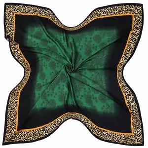 Green leopard floral square silk scarf with orange borders on white background
