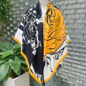 Detail of 130cm silk scarf with yellow and black hand-painted rose floral pattern