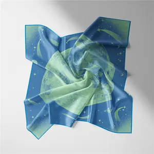Detailed top view of a dark blue silk scarf featuring celestial planet and star patterns