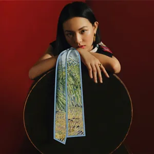 Detail of silk twilly scarf featuring Van Gogh oil painting pattern on silk fabric