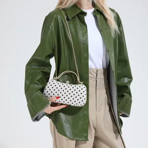 Polka dot hardshell evening clutch with gold metal handle and chain for stylish women
