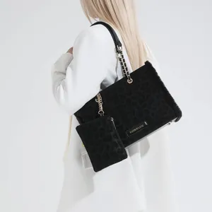 Borsa tote vintage leopardata nera con tracolla a catena e piccolo borsellino coordinato