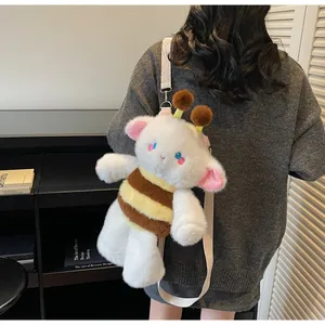 Detailed view of cute plush sheep backpack with bee stripes and adjustable canvas straps