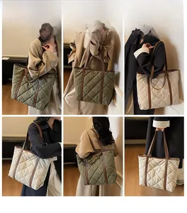 Quilted tote bag in army green and beige featuring classic rhombic patterns and long straps