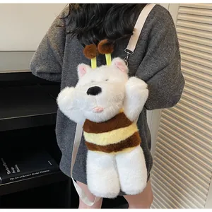 Detail of cute bear plush backpack with soft faux fur and adjustable fabric shoulder strap