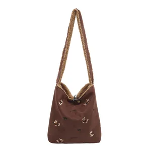 Brown suede tote bag with puppy embroidery and faux shearling trim details