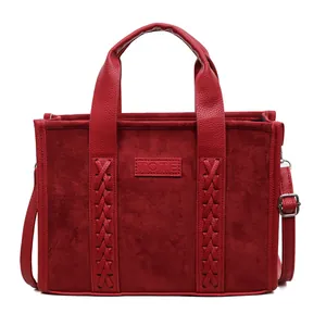 Deep red suede tote bag with minimalist retro design and textured leather handles