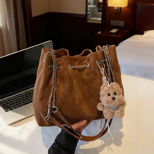 Women Quilted Faux Suede Bucket Bag Fashion Drawstring Shoulder Bag With Plush Bear Keychain Chain Strap Casual Tote Bag