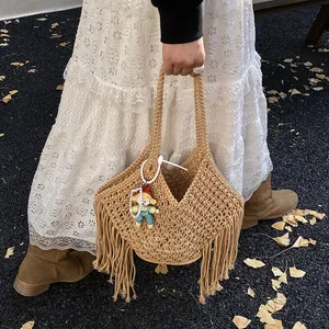 Vintage handgemaakte geweven strandtas met lange franjes en parel hanger