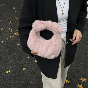 Chic light pink plush cloud bag for women, soft faux fur handbag for autumn winter styles