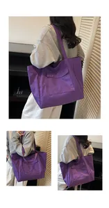 Makro-Detail der lila karierten Nylon-Einkaufstasche mit vorderer Klappentasche