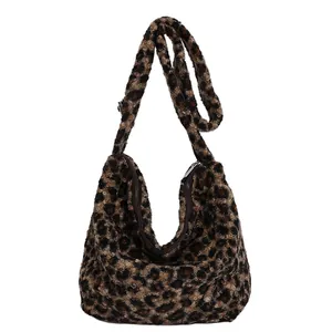 Chic leopard print plush hobo bag with crescent shape and shoulder strap for winter