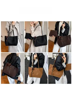 Detail view of large matte leather tote bags in black and brown with tassel charms
