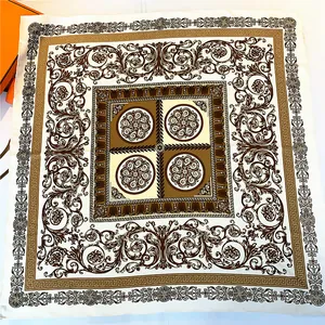 Detail of 90cm hand-rolled silk scarf featuring baroque floral prints and Greek key border