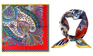 Detail of red paisley silk scarf showing intricate floral pattern and tied knot styling