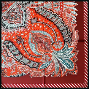 53cm square silk scarf with paisley floral prints in vibrant red and orange tones