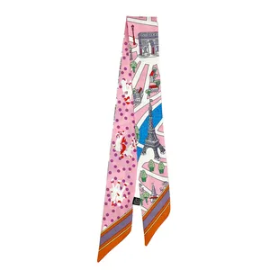 Detailansicht eines Twilly-Schals mit Eiffelturm-Motiv und rosa gepunktetem Muster