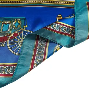 Detail of royal carriage silk scarf featuring vintage print and hand-rolled edges