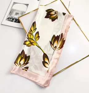 Detail of 90cm square silk scarf with maple leaf pattern and pink satin border