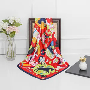 Detailed view of red cartoon horse silk scarf draped elegantly in a home decor setting