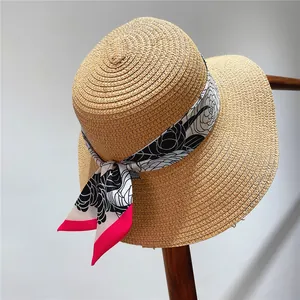Detailed macro view of woven straw hat texture with floral polyester decorative ribbon