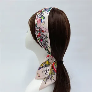 Detailed view of colorful butterfly floral ribbon tied as a stylish headband on mannequin
