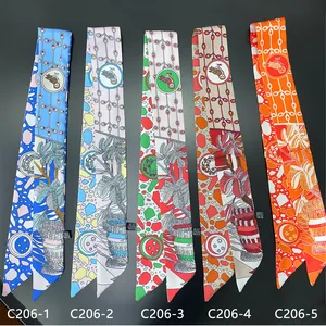 Flat lay of five cartoon floral narrow twilly scarves in various colorful patterns