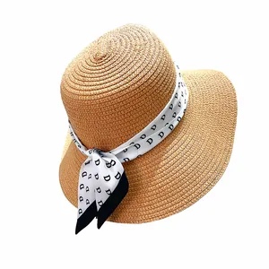 Minimalist straw sun hat for women featuring elegant D-letter print ribbon decoration