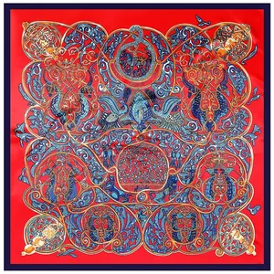 Close-up of red and blue vintage silk scarf featuring intricate horse and floral patterns