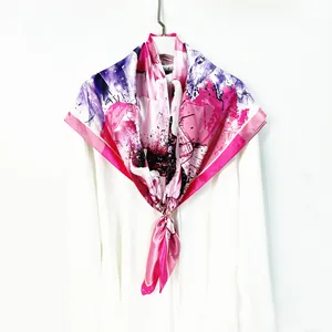Floral square silk scarf with magenta abstract print styled on a white shirt