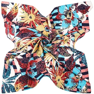 Macro detail of high-shine satin sunflower square scarf with bold artistic patterns