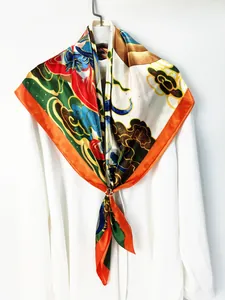Detail of silk scarf with colorful auspicious cloud patterns tied on a white shirt collar