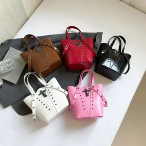 Gothic bucket bags with rivets and metallic cross charm in five vibrant stylish colors