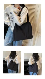 Detailed views of a large black tote bag featuring lightweight fabric and slim shoulder straps