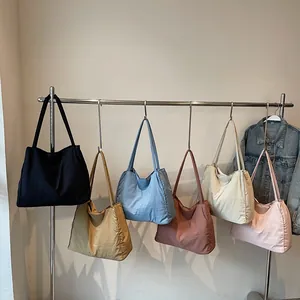 Minimalist canvas tote bag for women in six colors including khaki and light blue
