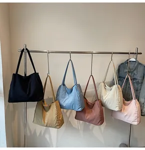 Showcase of minimalist large capacity tote bags in six stylish colors for commuting